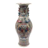 A large Canton famille rose baluster vase: the neck and shoulders with applied lion dogs and