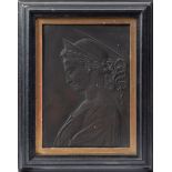 After Donatello, Saint Cecilia: a copper low relief plaque contained in an ebonised frame,