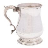 A George III silver mug, maker's mark worn, London, 1764: crested,