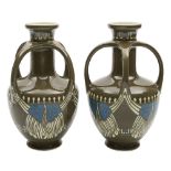 A pair of Villeroy & Boch Art Nouveau vases: each of oviform with raised neck supported by four