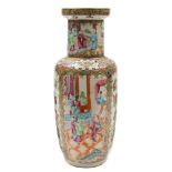 A Canton famille rose rouleau vase: painted with panels of figures on pagoda terraces and brightly