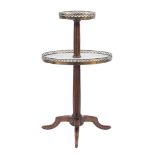 A French beechwood, white marble and brass galleried circular two tier graduated dumb waiter:,