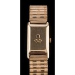 A gentleman's 9ct gold cased duo-dial, rectangular wristwatch: with concealed hour and second dials,