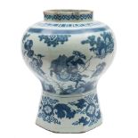 A Frankfurt blue and white delftware vase: of globular form with octagonal lower section,