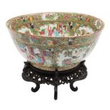 A Canton famille rose punch bowl: painted with panels of birds,