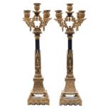 A pair of Willian IV patinated gilt-metal five-light candelabra: of neo-gothic form in the manner