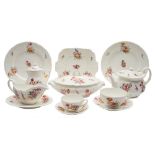 An extensive Coalport porcelain part dinner and tea service: moulded with acanthus scrollwork and