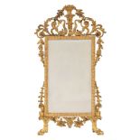 A Continental carved gilt gesso pier mirror:,