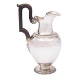 A Continental silver wine ewer: of baluster form with banded floral decoration,