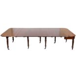 A Regency mahogany and inlaid concertina action extending dining table:,