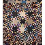 A Victorian quiltwork quilt: worked in squares, triangles and stellar patches by L Maunder,