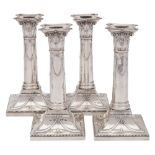 A set of four Victorian silver candlesticks, maker Thomas Bradbury & Sons, London,