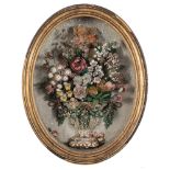 A Victorian oval shell display: of flowers in a vase, contained in an oval case, 40 x 30cm.