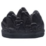 A Chinese mountain-form inkstone: in the form of three peaks with animals and birds around the base,