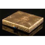 A 9ct gold samodorok cigarette case: with oval cabochon sapphire thumb piece, London Assay marks,