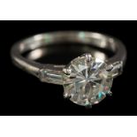 A 20th century diamond solitaire ring: the round, brilliant-cut diamond approximately 8.