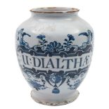 A pair of London blue and white delftware dry drug jars: each painted with an elaborate strapwork