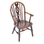 A child's early 19th Century elm and beechwood wheel and stick back Windsor elbow chair:,