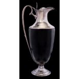 A Victorian clear glass and silver mounted claret jug, maker Edward Hutton, London,