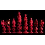 A late 19th Century Cantonese export carved Ivory figural chess set: one side stained red,