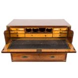 A 19th Century mahogany and brass bound secretaire military chest:, in two parts,