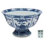 A pair of Chinese blue and white Ming-style stem bowls: each painted in simulated 'heaping and