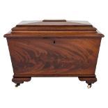 A Victorian mahogany sarcophagus shaped cellarette:, with a hinged top and interior divisions,