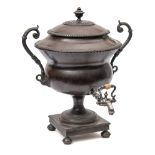 A 19th century bronze samovar: of traditional design with acanthus capped scrolling handles to the
