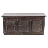 A late 17th Century oak rectangular coffer:, with a moulded hinged top,
