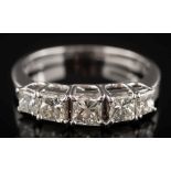 An 18ct white gold princess-cut diamond,