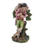 A Staffordshire pearl glazed pottery figure of 'The Lost Sheep Found': the shepherd carrying the