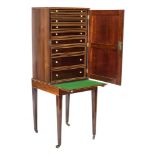 An early 19th Century rosewood and inlaid collectors cabinet on stand:,