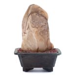A Chinese scholar's rock: the stone of mottled grey and cream colour,