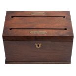 A 19th century mahogany and brass inlaid stationery box: the hinged lid with two slits for