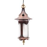 An Arts and Crafts copper and brass lantern: of cylindrical lantern,