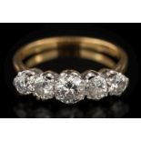 A graduated diamond five-stone ring: the round old, brilliant-cut diamonds approximately 0.20ct, 0.
