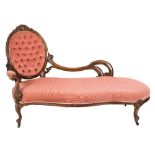 A Victorian carved walnut chaise longue:,