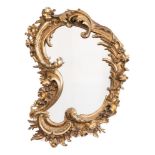 A 19th Century carved giltwood and gesso mirror:, in the Rococo taste,