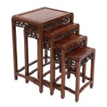 A set of Chinese rosewood and burr elm quartetto tables:, having pierced prunus aprons,