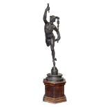 After Giambologna A life size cast metal figure of Mercury: holding a torch in his right hand and a