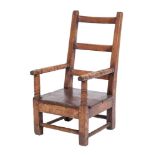 A child's early 19th Century ash, pine and fruitwood ladderback elbow chair:,