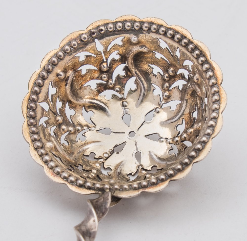 A George III silver Old English pattern straining spoon, maker Joseph Hicks, Exeter, 1815: crested, - Image 3 of 3