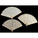 A 19th century Cantonese ivory brise fan: carved to a single side with figures in a pagoda