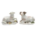 A pair of Chelsea models of a recumbent ewe and ram: their fleeces with greyish brown markings,