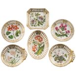 A fine early 19th century Coalport botanical part dessert service: painted with named botanical