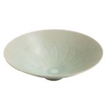 A Chinese Qingbai porcelain bowl: of flared conical form, covered in a crackled pale blue glaze,