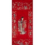 A late 19th century Chinese embroidered panel: embroidered in coloured silks,