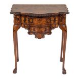 A late 18th/early 19th Century Dutch carved walnut and floral marquetry serpentine fronted side