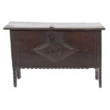 A 17th Century oak rectangular coffer:, of small size and plank construction,