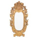 A 19th Century Continental carved giltwood and gesso oval mirror:,